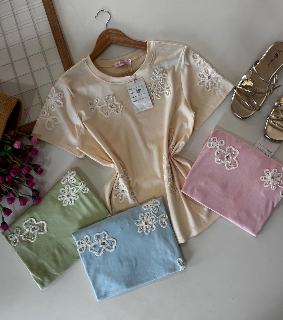 Blusa en algodón con aplicaciones