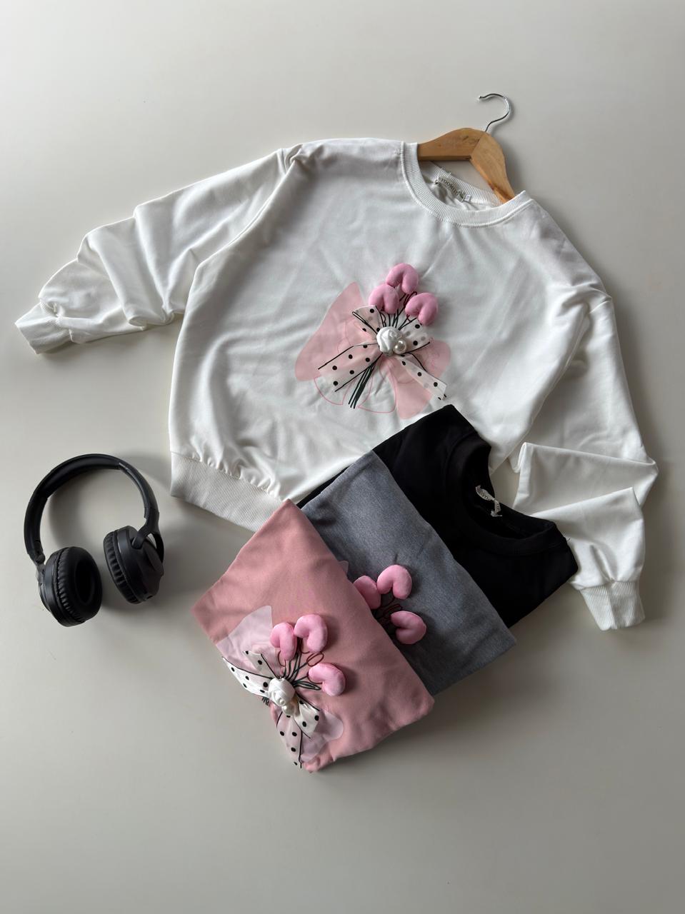 Saquito de Algodón Moño con Pompones 3D