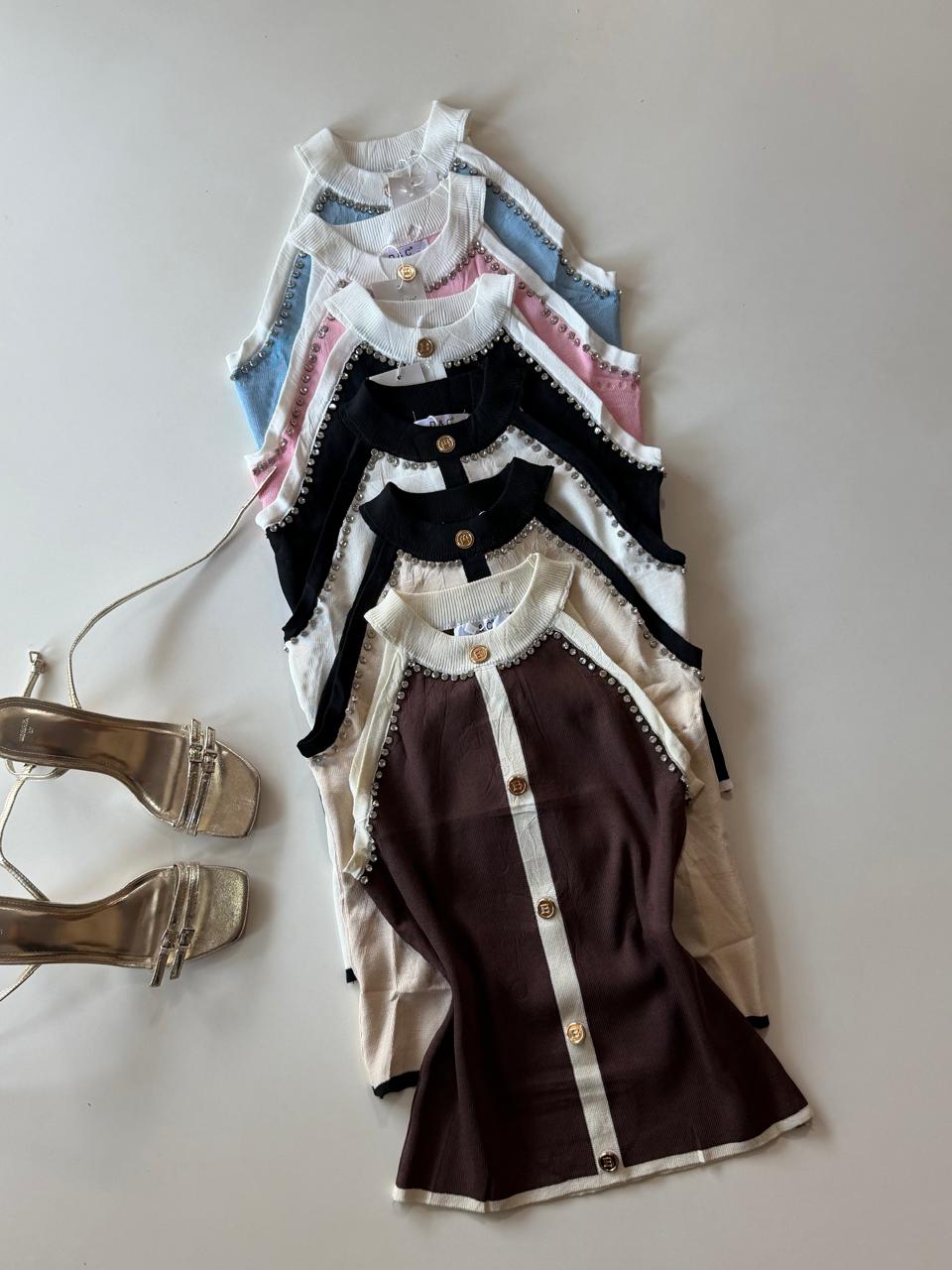 Blusa bicolor de hilo antialérgico con perlas